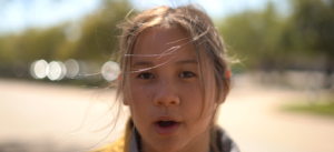 Girl face with a blurred background outside